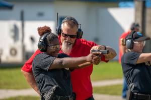 Female using Firearms