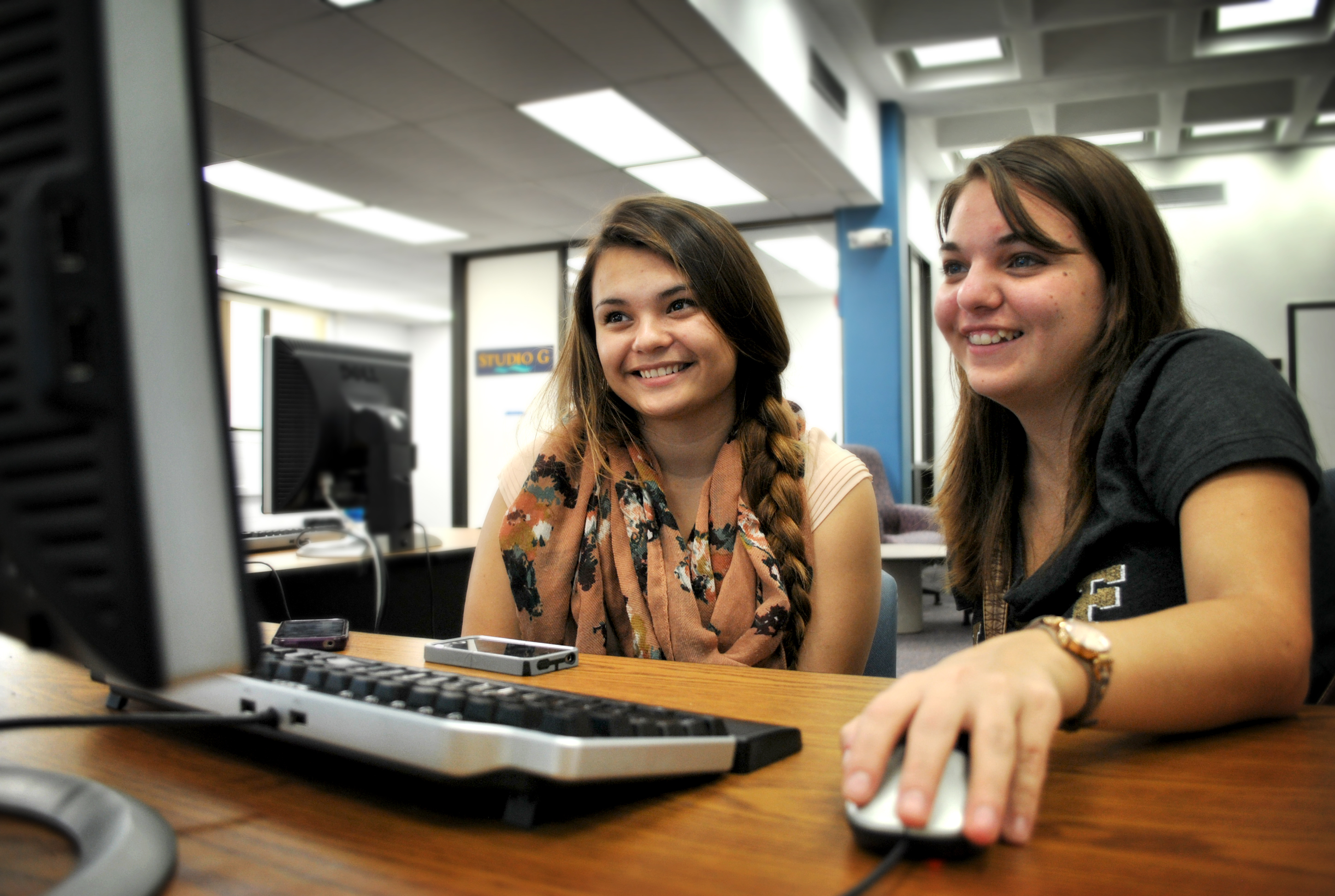 Two girls at a computer