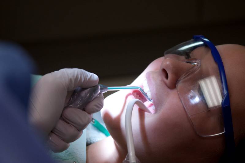 Young girl in dental chair