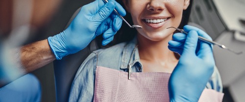 Patient with dental tools