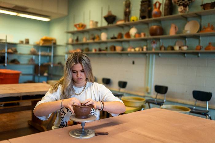 Student making ceramics