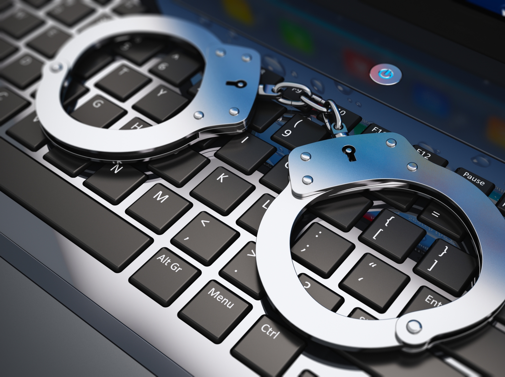 Handcuffs on top of a keyboard