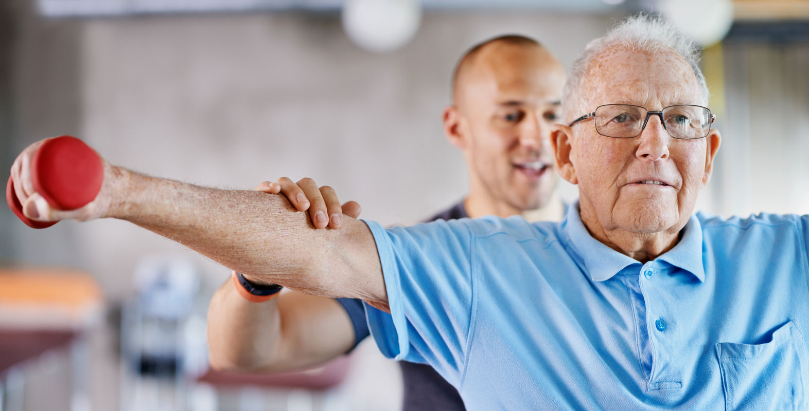 image of elderly man lifting weights