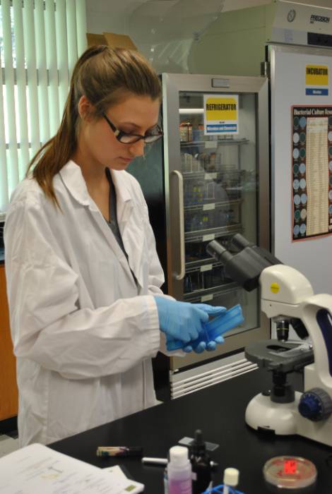 Student with microscope