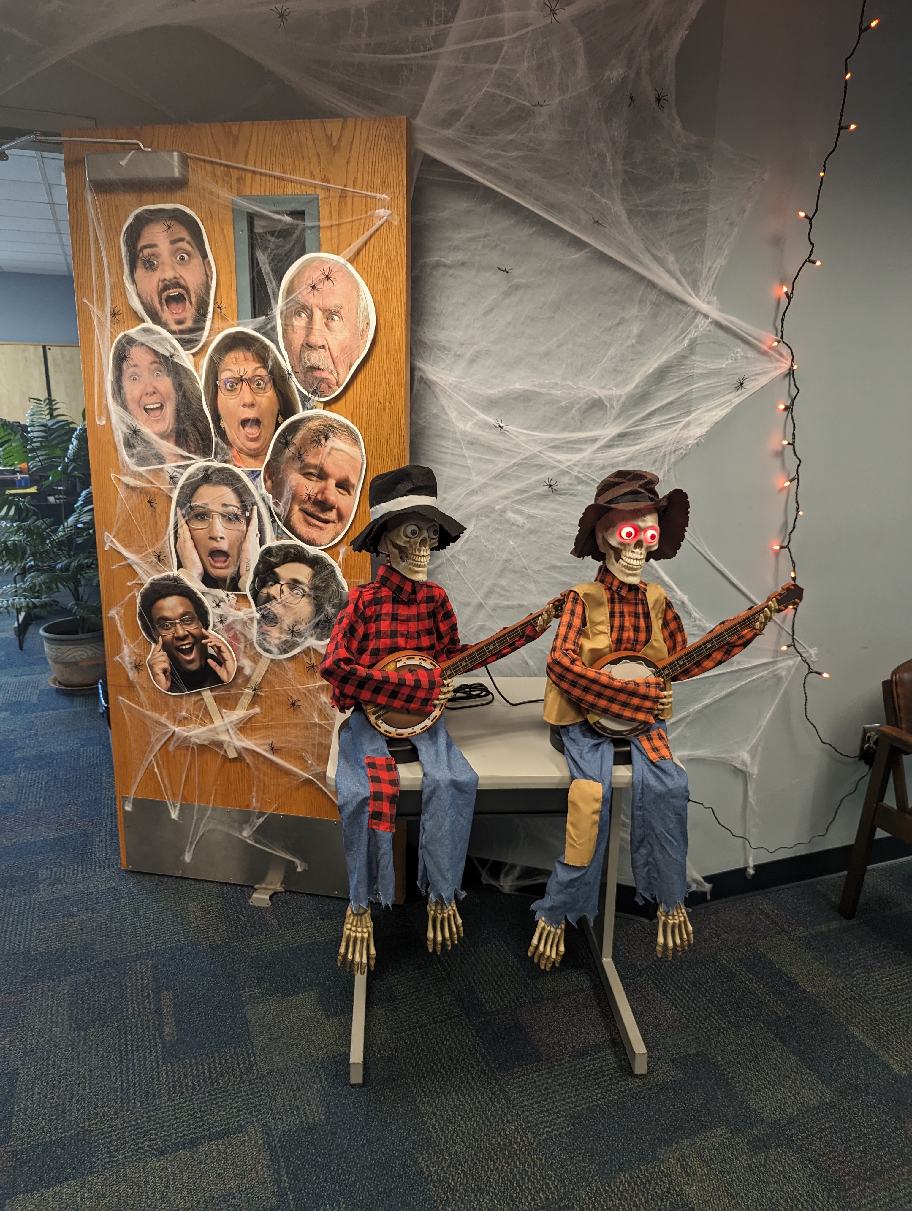 Halloween Decorations outside the GCSC's Math Tutoring Lab in Student Union West, 2nd Floor, Room 261. Skeletons playing the banjo.